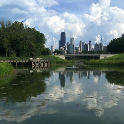 View of city against cloudy sky