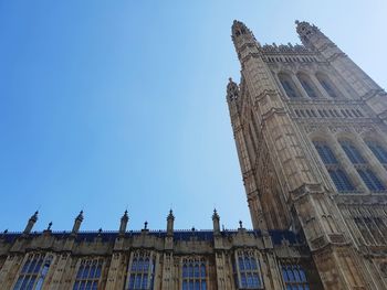 Low angle view of building against blue sky