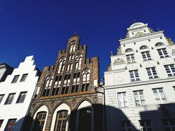 Low angle view of cathedral against clear blue sky