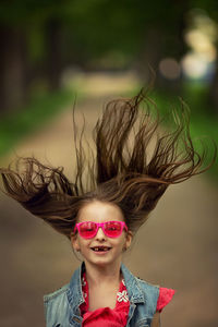 Portrait of girl wearing sunglasses