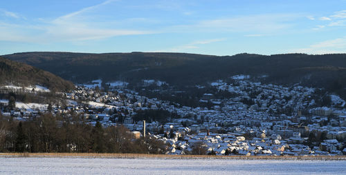 View of townscape against mountain range