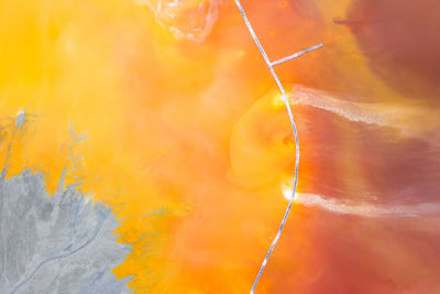 Aerial view of chemical mining waste residuals flooding into a settling basin. geamana, romania