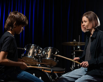 Friends playing drum