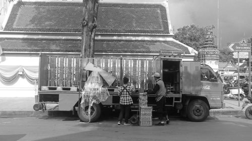 Man working on street in city