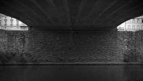 Arch bridge over river