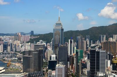 Modern buildings in city against sky