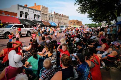 Crowd on street in city