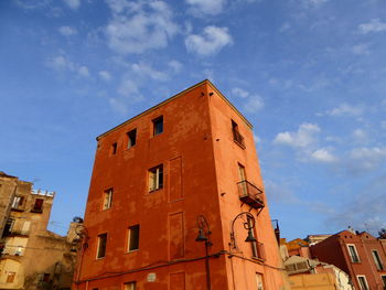 Low angle view of old building against sky