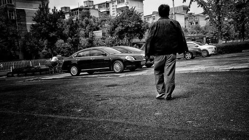 Woman walking on road