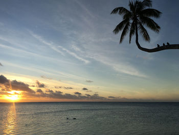 Scenic view of sea against sky at sunset