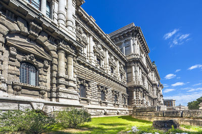 Low angle view of old building against sky