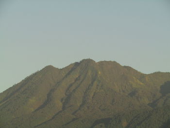 Scenic view of mountains against clear sky