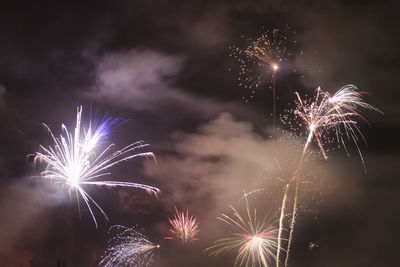 Firework display at night