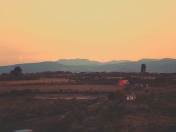 Scenic view of mountains at sunset