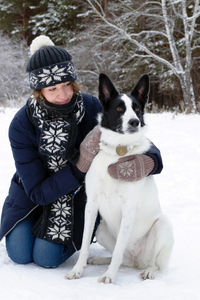 Full length of a dog on snow