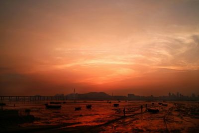 Scenic view of sea at sunset