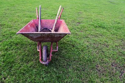 High angle view of old equipment on field