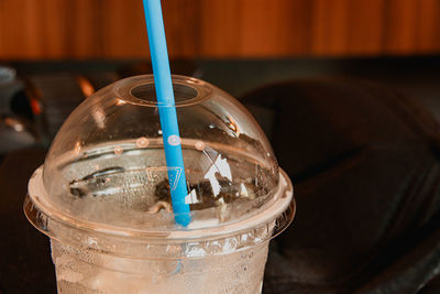 Close-up of glass of jar on table