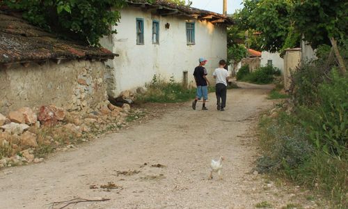 People walking in alley