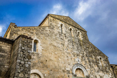 Low angle view of old building against sky