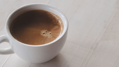 Close-up of coffee on table