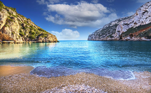 Beautiful scenery at grandella beach in javea, alicante, spain.