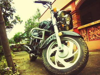 Motor scooter parked in parking lot