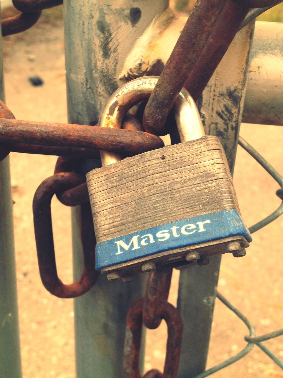 metal, metallic, close-up, rusty, focus on foreground, padlock, safety, chain, text, security, protection, lock, communication, western script, connection, fence, railing, day, strength, no people