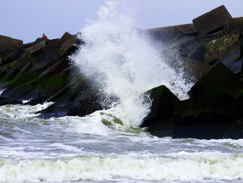 Waves splashing on rocks
