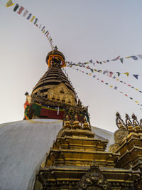 Low angle view of traditional building against clear sky