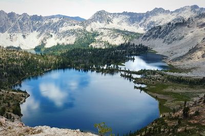 Scenic view of goat lake by sawtooth mountains