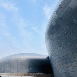 Low angle view of modern building against sky