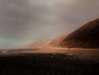 Scenic view of land against sky