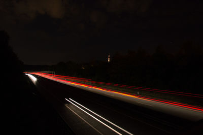 Light trails on road at night