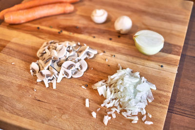 High angle view of chopped bread on cutting board