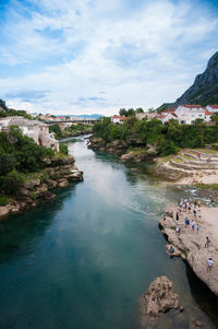 View of river passing through city