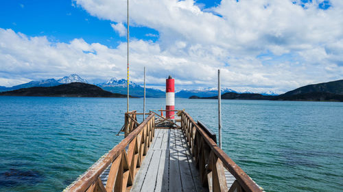 Sailboat on sea against sky