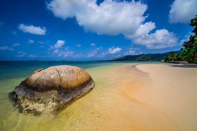 Panoramic view of beach against sky