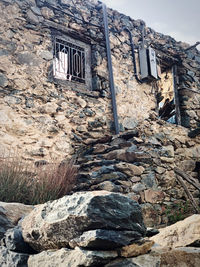 Low angle view of old abandoned building