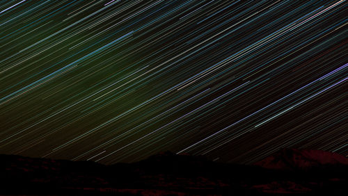 Low angle view of star field against sky at night