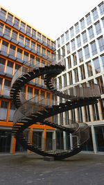 Low angle view of modern building against clear sky