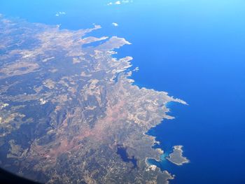 Scenic view of sea against sky from an airplane