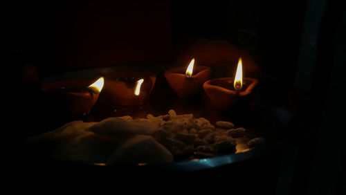 Close-up of burning candle