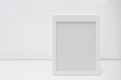 Close-up of white door