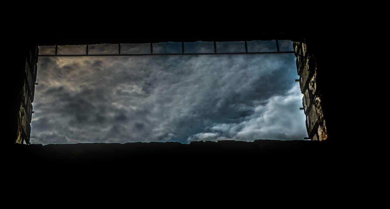 LOW ANGLE VIEW OF SKY THROUGH WINDOW