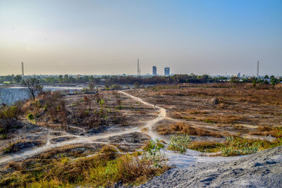 Scenic view of land against clear sky