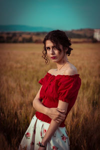 View of a woman in wheat field