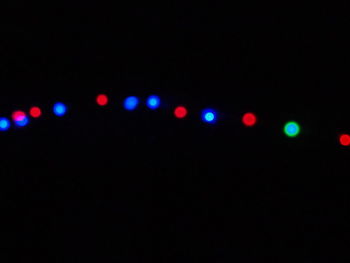 Close-up of illuminated lights at night