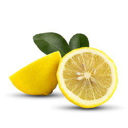 Close-up of lemon slice against white background