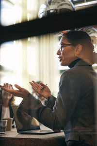 Young woman using mobile phone
